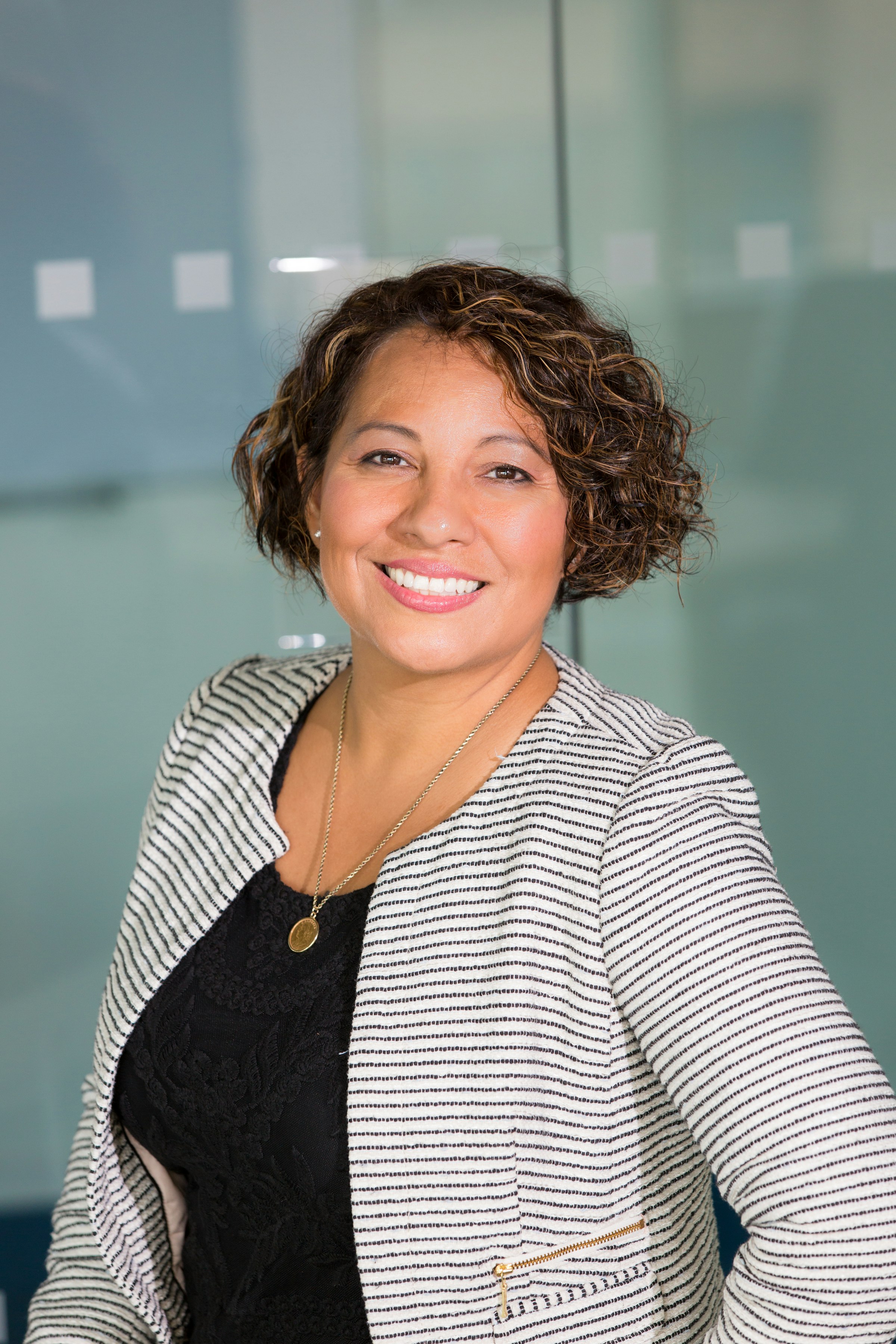 A funding advisor, smiling, ready to help